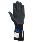 Guanti Alpinestars Tech-1 ZX V4, guanti da corsa per auto, nero e blu, vista del palmo con tecnologia di grip 3D in silicone grigio, etichette di certificazione FIA e SFI sul polsino, protezione professionale per motorsport