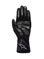 Guanti Alpinestars Tech-1 K Race V2 Graphic 1, guanti da kart, nero, grigio e bianco, vista del palmo con motivo antiscivolo in silicone bianco e logo Alpinestars sul polsino.