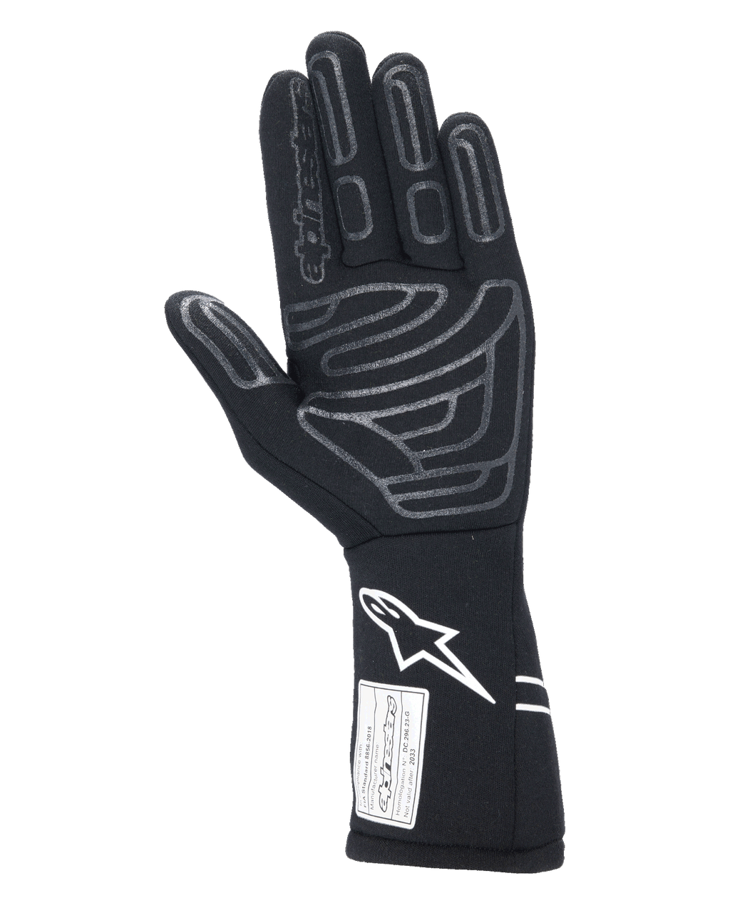 Guanti Alpinestars Tech-1 Start V4 FIA, guanto da auto racing nero, vista del palmo con motivi in silicone grigio su dita e palmo, logo Astars bianco sul polsino allungato, etichetta di certificazione FIA, attrezzatura professionale per motorsport