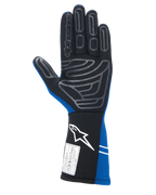 Guanti Alpinestars Tech-1 Start V4 FIA, guanti da corsa auto, blu reale e nero, vista del palmo con motivo grip in silicone grigio su dita e palmo, polsino allungato con logo bianco ed etichetta di omologazione FIA