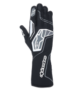 Guanti Alpinestars Tech-1 KX V4, guanti da karting, nero antracite, vista posteriore con mesh traspirante a doppio strato, dettagli grafici grigi e bianchi, branding Alpinestars in evidenza sul polso e sulle nocche, equipaggiamento tecnico da corsa