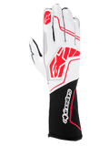 Guanti Alpinestars Tech-1 KX V4, guanti da karting, nero bianco rosso, con parte superiore in mesh bianco traspirante, loghi Alpinestars rossi e polsino nero con logo testuale bianco.