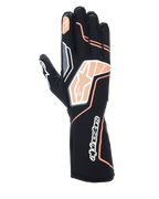 Guanti Alpinestars Tech-1 KX V4, guanti da karting, nero e arancione fluorescente, con struttura in mesh traspirante, dettagli grafici arancioni e bianchi, logo Alpinestars sulle nocche e sul polsino, design racing professionale