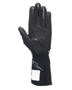 Guanti Alpinestars Tech-1 KX V4, guanti da karting, nero, vista del palmo con motivo grip in silicone 3D, cuciture esterne e polsino a coste con logo Astars grigio, attrezzatura professionale per motorsport