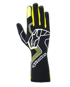 Guanti Alpinestars Tech-1 Race V4, guanti da corsa automobilistica, nero con accenti giallo fluo e bianchi, grande logo a stella sul dorso e stella sull'indice, design con motivi geometrici e polsino lungo