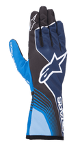 Guanti Alpinestars Tech-1 K Race V2 Future, guanti da karting, blu navy e azzurro con accenti neri, grande logo a stella bianco, linee curve dinamiche, sezioni delle dita in mesh, design sportivo da motorsport con branding bianco