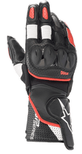 Guanti Alpinestars SP-2 V3, guanti da moto racing, nero con accenti bianchi e rosso acceso, protezione nocche rigida in TPU, struttura in pelle traforata sul polsino, inserti elastici a fisarmonica bianchi sulle dita, logo GP Series in evidenza
