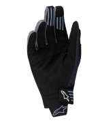Alpinestars Techstar Gloves 2025, guanti da motocross, nero, vista del palmo in pelle scamosciata sintetica con dettagli traforati, grip in silicone sulla punta delle dita e logo Alpinestars bianco sulla chiusura del polso