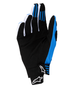 Guanti Alpinestars Techstar 2025, guanti da motocross, nero e blu, vista del palmo che mostra la costruzione in pelle scamosciata sintetica rinforzata, grip in silicone blu sulle dita e chiusura del polso senza cuciture con loghi Astars bianchi.