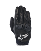 Alpinestars SP X 7, guanti da moto sportivi corti, nero e bianco, con costruzione in pelle traforata, protezione nocche in TPU a doppia densità e logo a stella Alpinestars bianco, progettati per la guida sportiva su strada