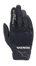 Guanto Alpinestars Honda Copper, guanto da moto urban nero, struttura in mesh testurizzato, scritta bianca 'Honda Motor Co. Ltd. Est. 1948' sull'indice, logo 'HONDA' e profilo della stella Alpinestars sul polso, protezione rigida per le nocche, equipaggiamento leggero per la guida su strada