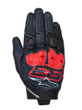 Guanti Alpinestars MM93 Spx 1, guanti da moto racing, neri con dettagli rosso acceso e bianchi, protezioni nocche rosse, con logo Marc Marquez 93 e marchio Alpinestars, tessuto testurizzato dal design sportivo