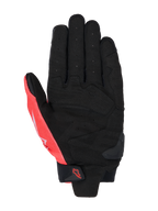 Guanti Alpinestars MM93 SP X 1, vista del palmo, nero e rosso fluo, costruzione in pelle sintetica con palmo traforato, sezioni rinforzate, slider in TPR sul palmo e cinturino in velcro sul polso con logo Alpinestars.
