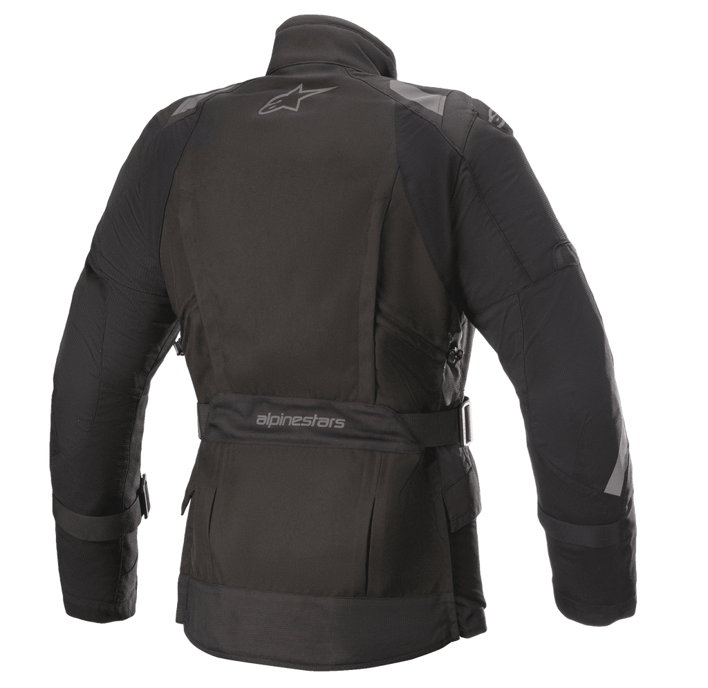 Giacca Alpinestars Stella Ketchum GORE-TEX da donna, giacca da moto in tessuto, nero, vista posteriore con logo Alpinestars, cinghia regolabile in vita con marchio e pannelli riflettenti su spalle e maniche per la visibilità del pilota.