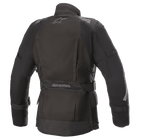 Giacca Alpinestars Stella Ketchum GORE-TEX da donna, giacca da moto in tessuto, nero, vista posteriore con logo Alpinestars, cinghia regolabile in vita con marchio e pannelli riflettenti su spalle e maniche per la visibilità del pilota.
