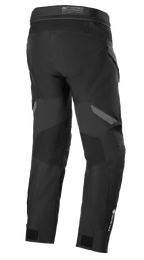 Pantaloni Alpinestars ST-7 2L GORE-TEX, nero e grigio scuro, vista posteriore, pantaloni da moto adventure touring impermeabili con pannelli rinforzati, marchio GORE-TEX sulla parte inferiore della gamba e cinturini regolabili alle caviglie