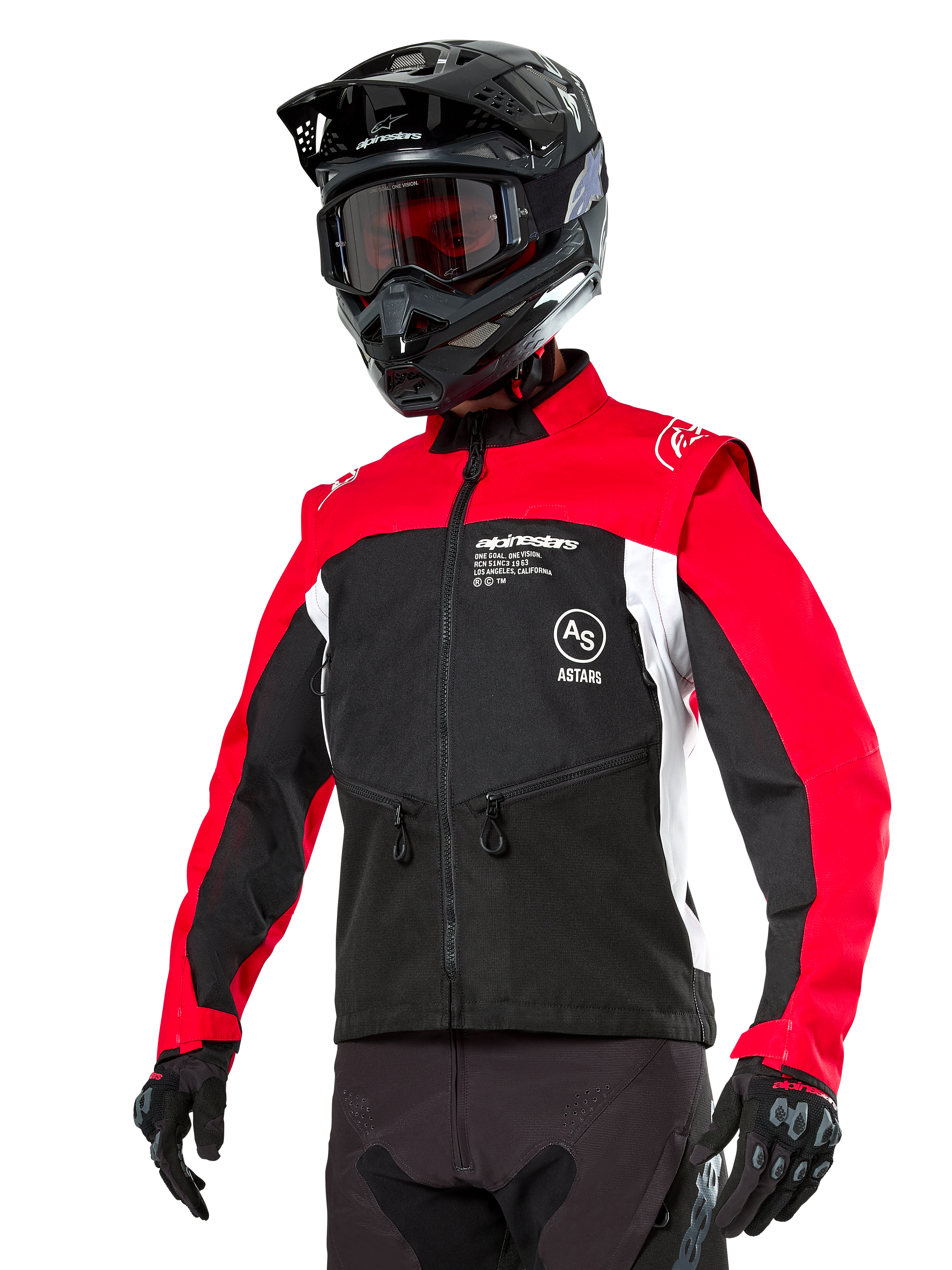 Giacca Alpinestars Pro-Dura, giacca da moto enduro fuoristrada, nero con blocchi di colore rosso acceso e bianco, indossata da un pilota con casco nero e maschera, dotata di tasche anteriori con zip e logo Alpinestars, struttura in tessuto resistente per trail riding