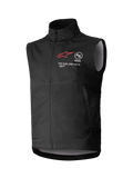 Alpinestars Techstar Softshell Vest, gilet nero da motocross senza maniche, colletto alto con cerniera frontale, logo a stella rosso con branding "ASTARS" e "ONE GOAL. ONE VISION." sul petto, tessuto softshell leggero e antivento con fodera interna grigio chiaro, progettato per il fuoristrada