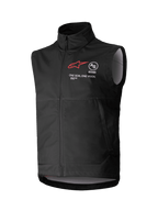Alpinestars Techstar Softshell Vest, gilet nero da motocross senza maniche, colletto alto con cerniera frontale, logo a stella rosso con branding "ASTARS" e "ONE GOAL. ONE VISION." sul petto, tessuto softshell leggero e antivento con fodera interna grigio chiaro, progettato per il fuoristrada