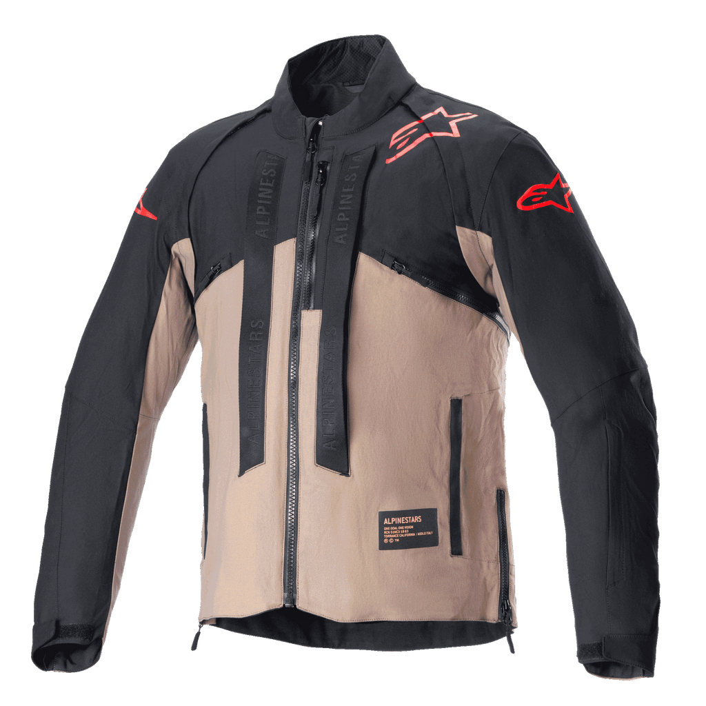 Giacca Alpinestars Techdura, giacca da moto fuoristrada, nero e marrone Falcon Brown, design bicolore con loghi a stella rossi su spalle e maniche, cinghie verticali con marchio Alpinestars sul petto, materiale tessile resistente