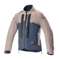 Giacca Alpinestars Techdura, giacca da moto off-road, Falcon Brown e Night Navy, vista frontale, costruzione bicolore con branding Alpinestars nero verticale, logo arancione sulla spalla, colletto alto e zip frontale, abbigliamento tecnico per guida enduro e adventure