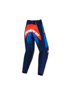 Alpinestars Pantaloni Racer Nomur Bambino 2026, pantaloni da motocross, blu navy scuro, arancione e blu UCLA, vista posteriore con un ampio pannello arancione sulla seduta e logo bianco, dettagli punteggiati blu sulle cosce e costruzione in tessuto resistente per la guida fuoristrada.