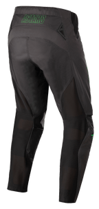 Alpinestars Techstar Phantom Pants, pantaloni da motocross, antracite e verde neon, vista posteriore con marchio 'ASTARS' verde neon sulla vita, pannelli di ventilazione in mesh sul retro delle gambe e seduta rinforzata per la resistenza nelle corse off-road