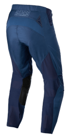 Alpinestars Techstar Phantom Pants, pantaloni da motocross, blu scuro, vista posteriore con pannelli in rete traspirante e inserti in pelle nera all'interno della gamba, con logo ASTARS sulla fascia in vita, progettati per prestazioni fuoristrada.