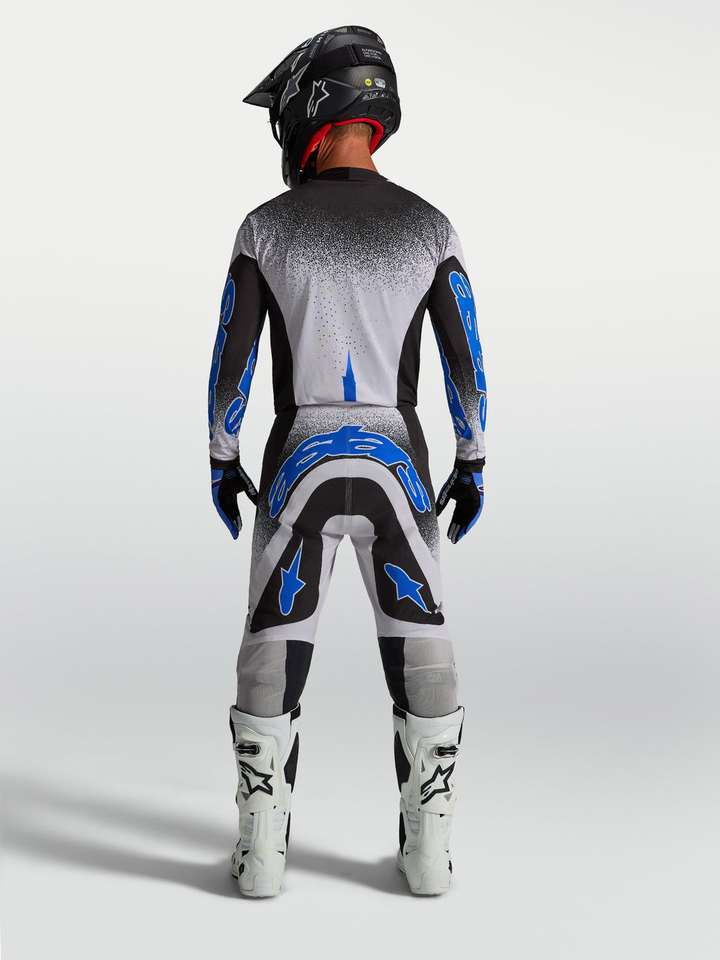 Alpinestars Pantaloni Supertech Hiten AFD, pantaloni da motocross da uomo, blu e bianchi, vista posteriore fuoristrada