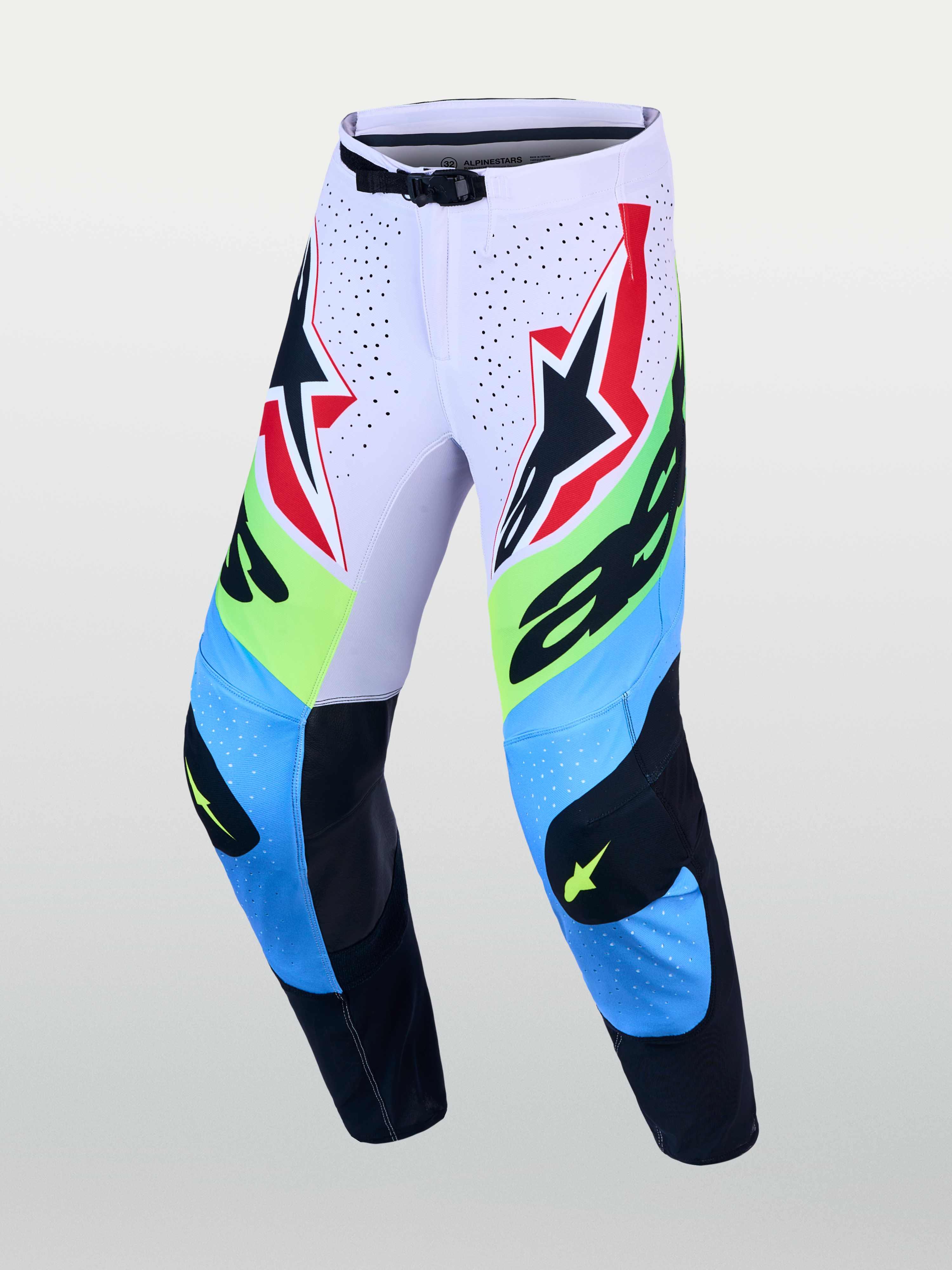 Alpinestars Pantaloni Supertech Dyna, pantaloni da motocross lilla chiaro e verde fluo con pannelli in pelle sulle ginocchia.