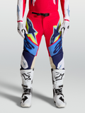 Alpinestars Supertech Dyna Pants, Motocross Racing Gear for Men, Fire Red and Navy Blue with White and Yellow accents, Featuring goat leather knee panels and magnetic buckle closure.
