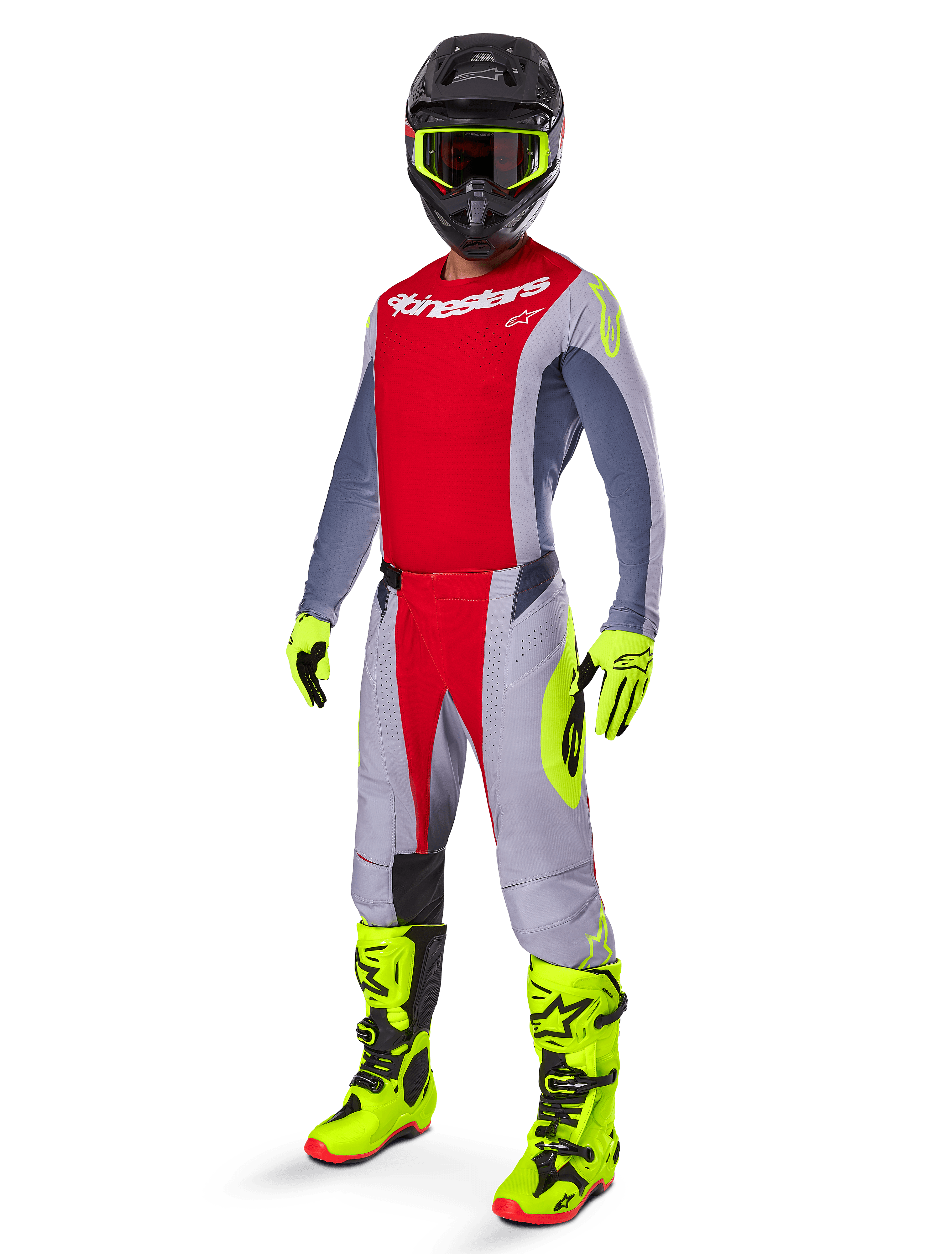 Pilota di motocross con il set Alpinestars Techstar Melt Gear 2025, maglia e pantaloni rossi e grigi, guanti e stivali giallo neon, casco nero, kit completo per gare fuoristrada