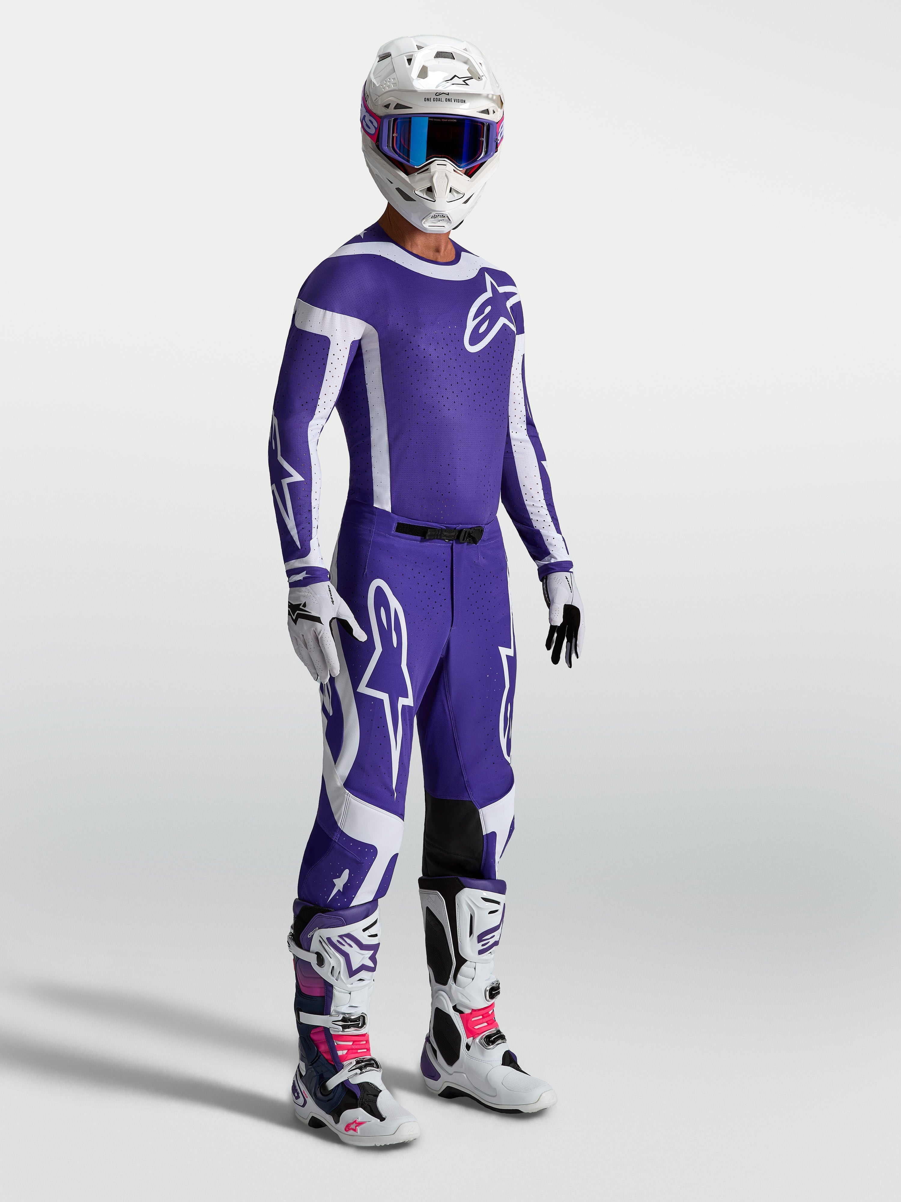 Alpinestars Pantaloni Supertech Vesta, pantaloni motocross professionali, blu e bianchi, vestibilità atletica da gara.