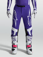 Alpinestars Pantaloni Supertech Vesta, pantaloni motocross racing uomo, blu e bianchi, vestibilità atletica e rip-stop.