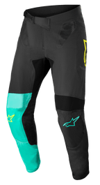 Alpinestars Supertech Blaze Pants, pantaloni da motocross, nero, verde pastello e giallo fluo, con pannelli asimmetrici sulle gambe, loghi a stella gialli e verde acqua, inserti di ventilazione in mesh e cintura regolabile a cricchetto per corse fuoristrada