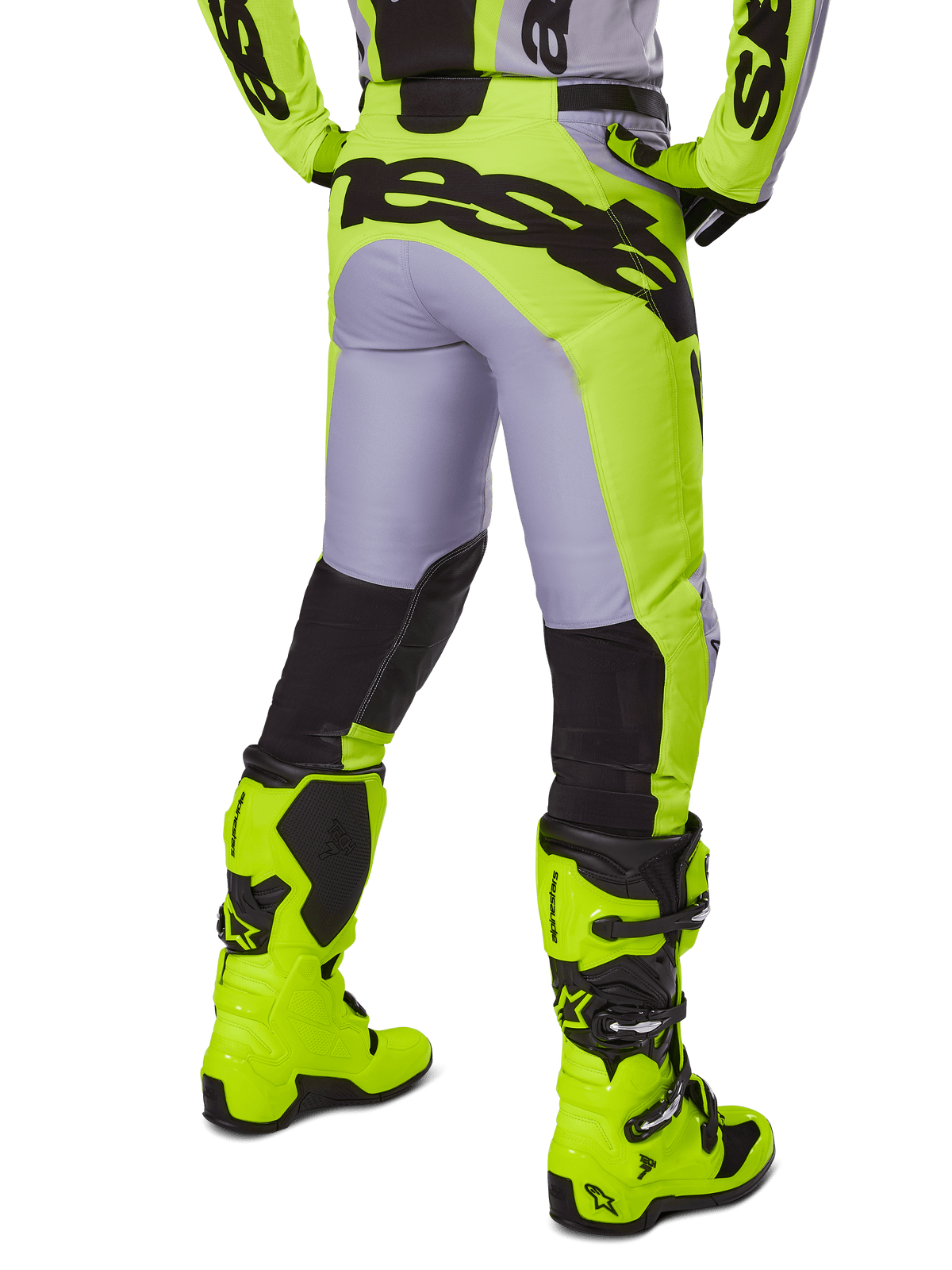 Alpinestars 2025 Racer Veil Pants, pantaloni da motocross, grigio e giallo fluo, vista posteriore che mostra la costruzione ergonomica con grande marchio nero sulla seduta, pannelli neri sulla parte inferiore della gamba e stivali da corsa giallo fluo abbinati.