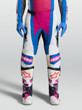 Alpinestars Pantaloni Techstar Maven, pantaloni da motocross bianchi e blu con dettagli corallo e pannelli in pelle.