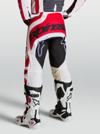 Alpinestars Pantaloni Techstar Maven, pantaloni motocross da uomo, rossi e bianchi, seduta rinforzata e vestibilità atletica.