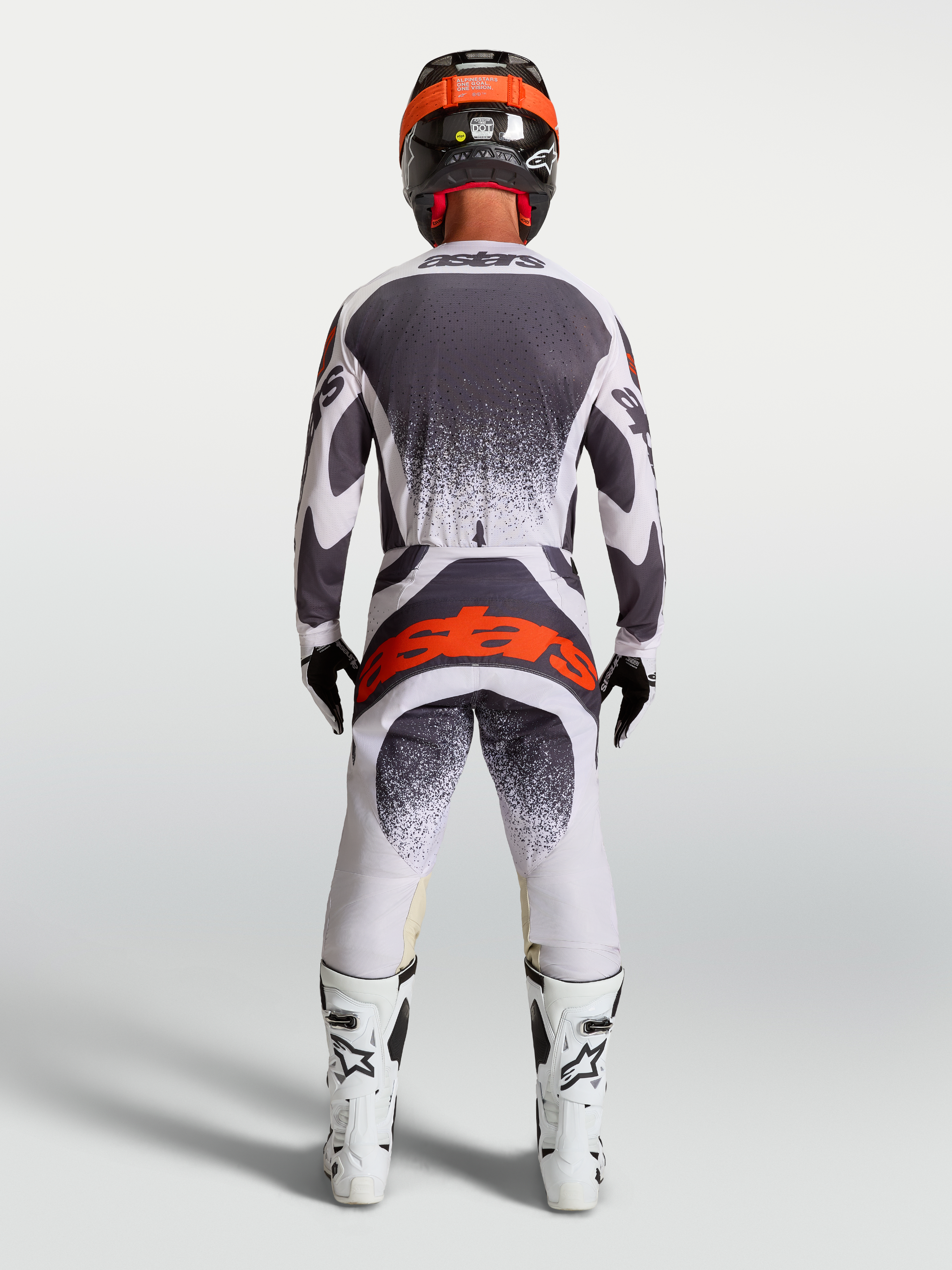 Alpinestars Pantaloni Techstar Swan, pantaloni da motocross da uomo, lilla chiaro e grigio scuro con dettagli rosso fluo, vista posteriore, vestibilità racing per performance fuoristrada.