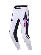 Pantaloni Alpinestars Supertech AFD Vista 2026, pantaloni da motocross, bianco con accenti sfumati in nero e rosa-viola, con loghi a stella prominenti sulle cosce, traforature al laser e vestibilità atletica per corse fuoristrada di livello professionale