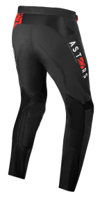 Alpinestars Supertech Foster Pants, pantaloni da motocross, nero, con branding verticale ASTARS bianco e loghi a stella rossi, struttura in tessuto ad alte prestazioni con pannelli in rete per ventilazione e libertà di movimento