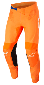 Alpinestars Supertech Foster Pants, pantaloni da motocross racing, arancione e nero, con fibbia blu in vita, loghi a stella bianchi sulle ginocchia, pannelli interni rinforzati e ventilazione in rete tecnica