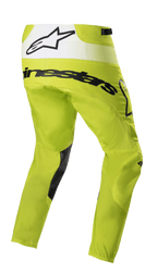 Alpinestars 2023 Techstar Push Pants, pantaloni da motocross, giallo fluo e bianco, vista posteriore di tre quarti con branding nero e pannello posteriore bianco con logo a stella, inserti neri nell'interno gamba, abbigliamento resistente per gare fuoristrada