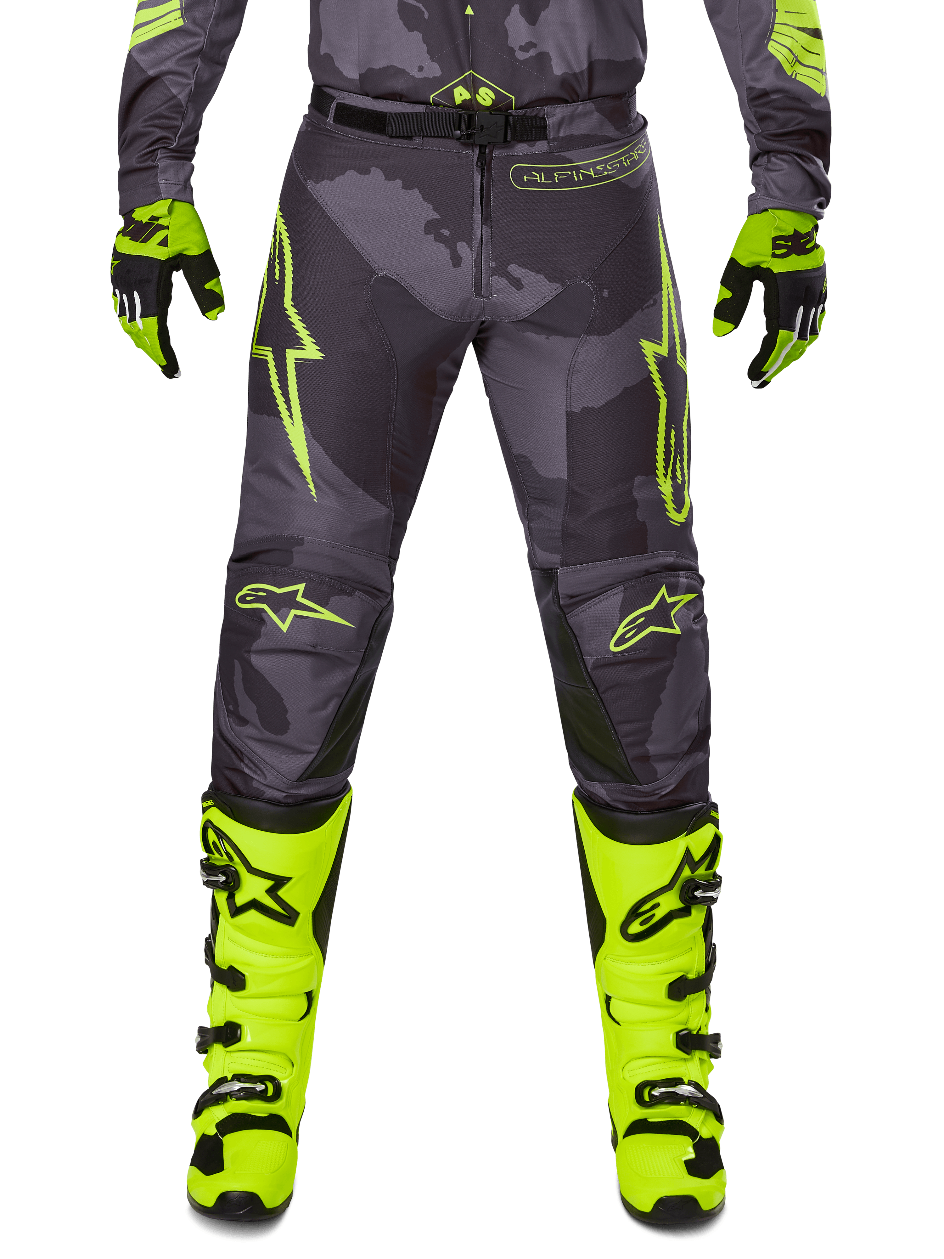 Alpinestars 2025 Racer Hollow Pants, pantaloni da motocross grigio scuro con dettagli giallo neon, stelle gialle, guanti e stivali giallo neon con dettagli neri, abbigliamento protettivo sportivo per fuoristrada