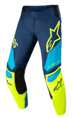Alpinestars Techstar Factory Pants, pantaloni da motocross, blu scuro, giallo fluo e azzurro, con pannelli interni neri sulle ginocchia, logo stella gialla sulla coscia, scritta "ONE GOAL ONE VISION" e zone di ventilazione traforate per abbigliamento fuoristrada ad alte prestazioni
