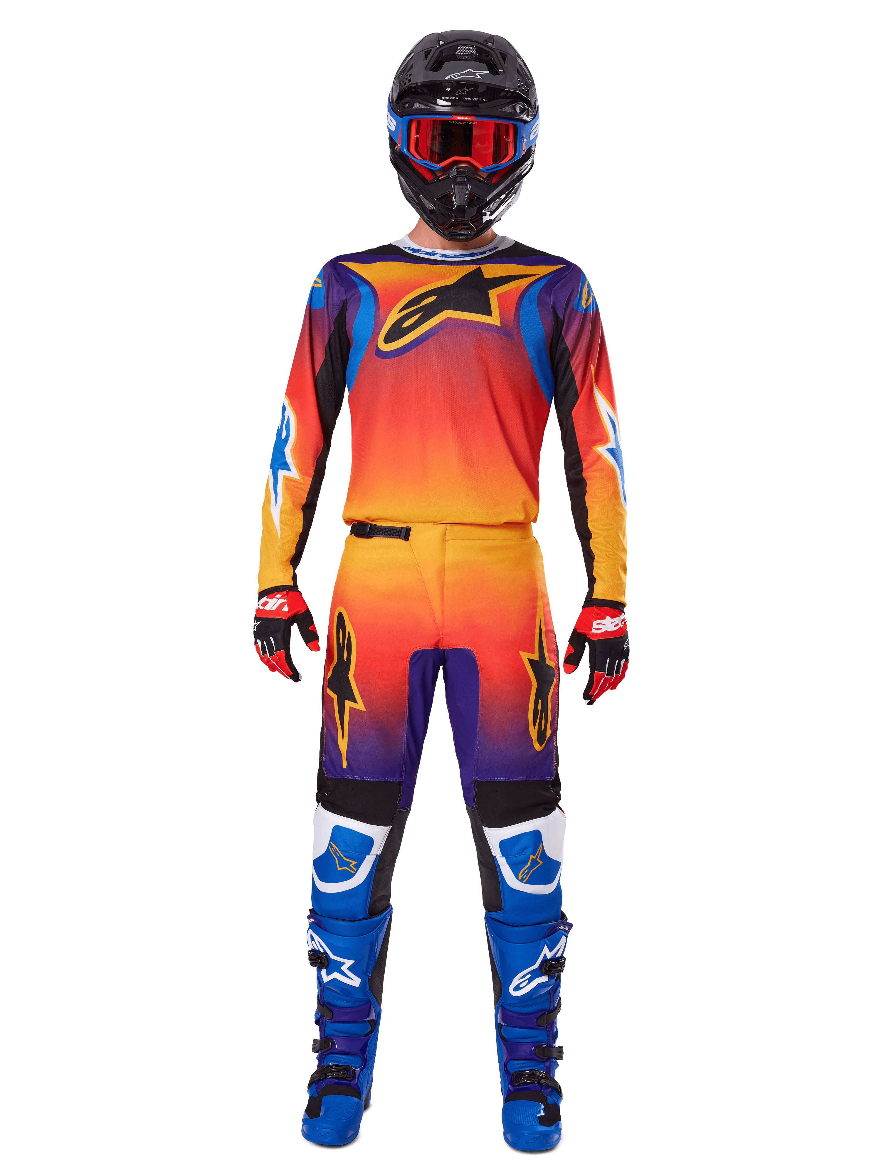 Alpinestars Pantaloni Fluid Wurx 2025, pantaloni da motocross, sfumatura multicolore arancione, giallo e viola, indossati con maglia coordinata, casco nero con occhiali blu, guanti rossi e neri e stivali blu, abbigliamento da gara motocross coordinato