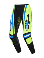 Alpinestars 2026 Techstar Nomur Pants, pantaloni da motocross, giallo fluo e blu navy scuro con accenti UCLA blue, caratterizzati dal logo a stella Alpinestars e marchio 'astars', pannelli rinforzati sulle ginocchia e dettagli traforati per la ventilazione.