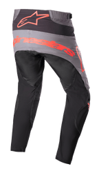 Alpinestars pantaloni Techstar Sein 2023, pantaloni da motocross, nero e rosso neon, vista posteriore con pannello della seduta grigio e grande marchio rosso neon, gambe pre-curvate ergonomiche, costruzione in tessuto resistente per prestazioni fuoristrada