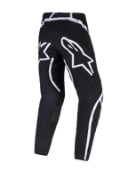 Alpinestars 2026 Fluid Apex Pants, pantaloni da motocross, bianco e nero, vista posteriore con grande logo a stella bianco sulla seduta, design ergonomico con accenti bianchi curvi, resistente poliestere 600D per prestazioni fuoristrada.