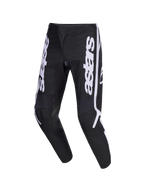 Alpinestars Pantaloni Fluid Apex 2026, pantaloni da motocross, nero e grigio con logo astars verticale bianco sulle gambe, design ergonomico sport-fit pre-curvato, robusta costruzione in poliestere 600D per la guida fuoristrada